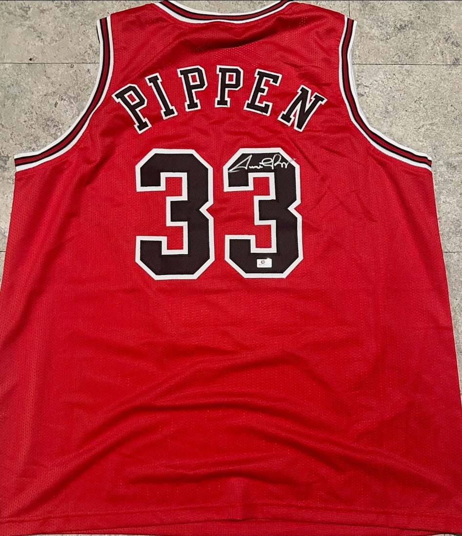 Scottie Pippen Chicago Bulls Autographed Custom Basketball Jersey coa: Scottie Pippen Chicago Bulls Autographed Custom Basketball Jersey GA coa - Autograph Location & coa # may vary JERSEY SIZE EXTRA LARGE - CUSTOM JERSEY MEANS NO LOGOS, NO TEAM NAMES, & NO BRAND NAMES