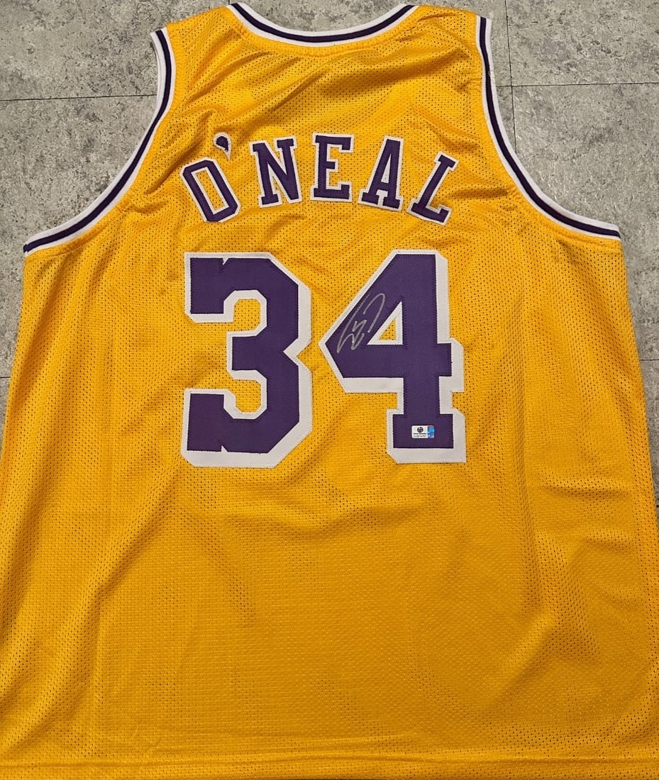 Shaquille O'Neal Los Angeles Lakers Autographed Custom Basketball Jersey coa: Shaquille O'Neal Los Angeles Lakers Autographed Custom Basketball Jersey GA coa - Autograph Location & coa # may vary JERSEY SIZE EXTRA LARGE - CUSTOM JERSEY MEANS NO LOGOS, NO TEAM NAMES, & NO BRAND 