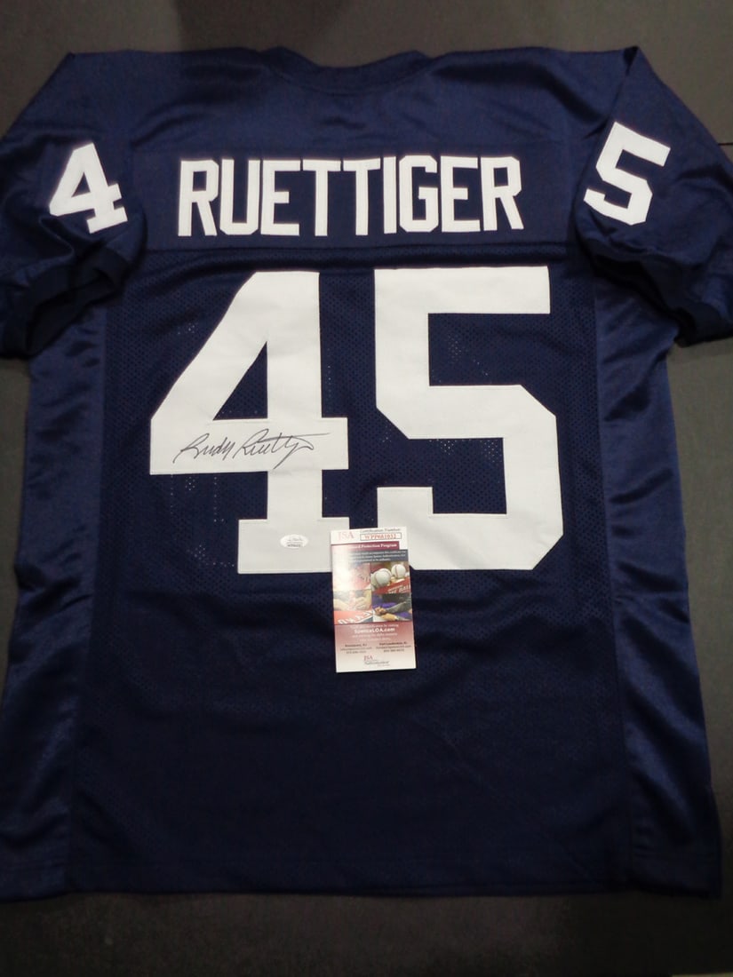 Rudy Ruettiger Notre Dame Fighting Irish Autographed Custom Football Jersey JSA coa: Rudy Ruettiger Notre Dame Fighting Irish Autographed Custom Football Jersey JSA Witnessed coa - Autograph Location & coa # may vary JERSEY SIZE EXTRA LARGE - CUSTOM JERSEY MEANS NO LOGOS, NO TEAM