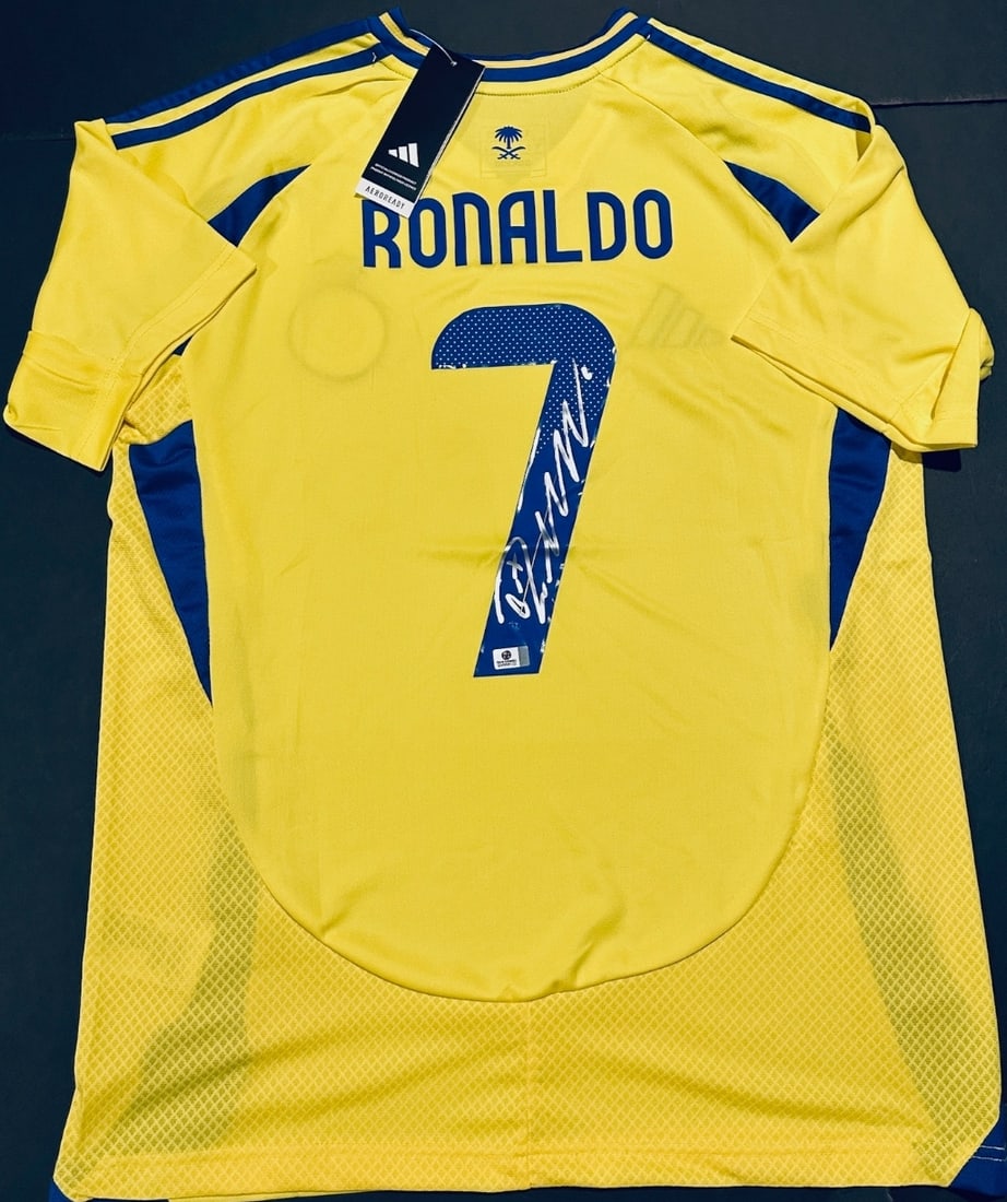Cristiano Ronaldo Al Nassr Autographed 2024-25 Adidas Home Soccer Jersey coa: Cristiano Ronaldo Al Nassr Autographed 2024-25 Adidas Home Soccer Jersey GA coa - Autograph Location & coa # may vary JERSEY SIZE EXTRA LARGE
