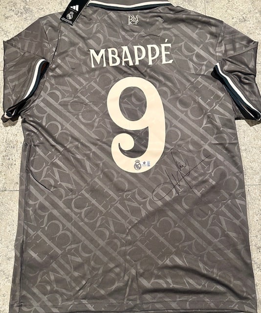 Kylian Mbappe Real Madrid Autographed 2024-25 Adidas Third Jersey coa: Kylian Mbappé Real Madrid Autographed 2024-25 Adidas Third Jersey GA coa - Autograph Location & coa # may vary JERSEY SIZE EXTRA LARGE