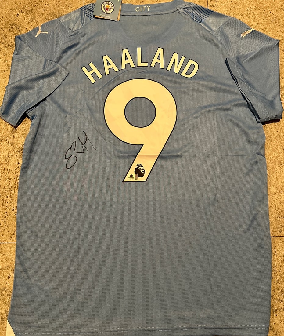 Erling Haaland Manchester City Autographed 2023-24 Puma Home Soccer Jersey coa: Erling Haaland Manchester City Autographed 2023-24 Puma Home Soccer Jersey GA coa - Autograph Location & coa # may vary JERSEY SIZE EXTRA LARGE