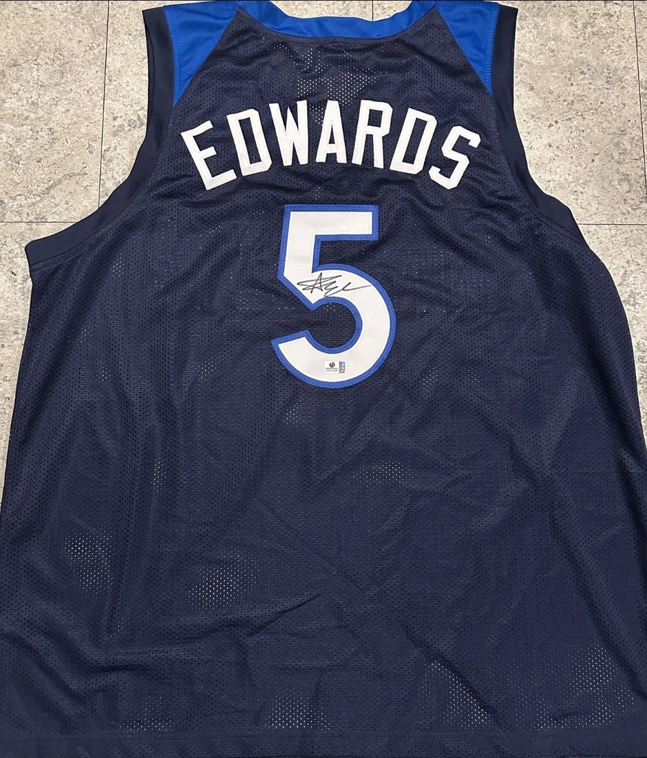 Anthony Edwards Minnesota Timberwolves Autographed Custom Basketball Jersey coa: Anthony Edwards Minnesota Timberwolves Autographed Custom Basketball Jersey GA coa - Autograph Location & coa # may vary JERSEY SIZE EXTRA LARGE - CUSTOM JERSEY MEANS NO LOGOS, NO TEAM NAMES, & NO
