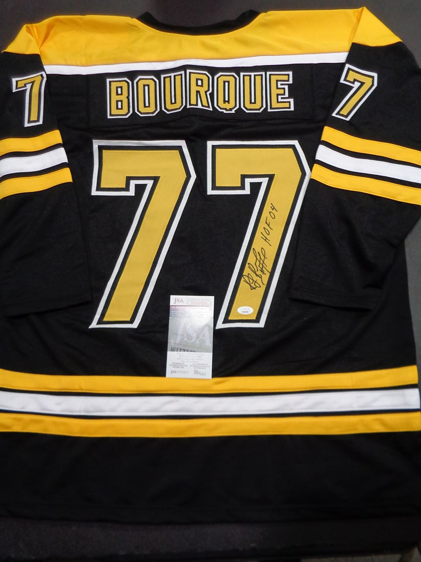 Ray Bourque Boston Bruins Autographed & Insc Custom Hockey Jersey JSA coa: Ray Bourque Boston Bruins Autographed & Inscribed "HOF 04" Custom Hockey Jersey JSA Witnessed coa - JERSEY SIZE EXTRA LARGE - CUSTOM JERSEY MEANS NO LOGOS, NO TEAM NAMES, & NO BRAND NAMES