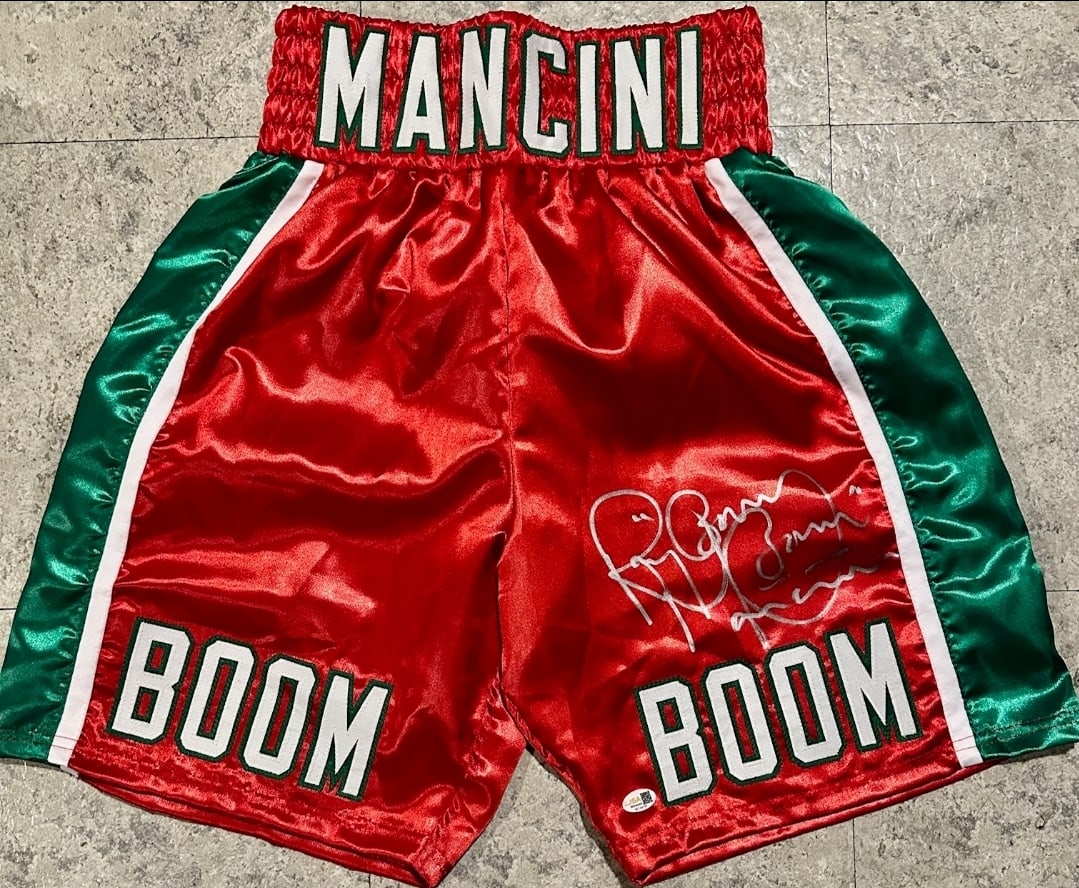 Ray BOOM BOOM Mancini Former Lgtweight Champion Autographed Boxing Trunks JSA Hologram: Ray "BOOM BOOM" Mancini Former NABF & WBA Lightweight Boxing Champion Autographed Boxing Trunks JSA Witnessed QR Hologram - Autograph Location & coa # may vary 