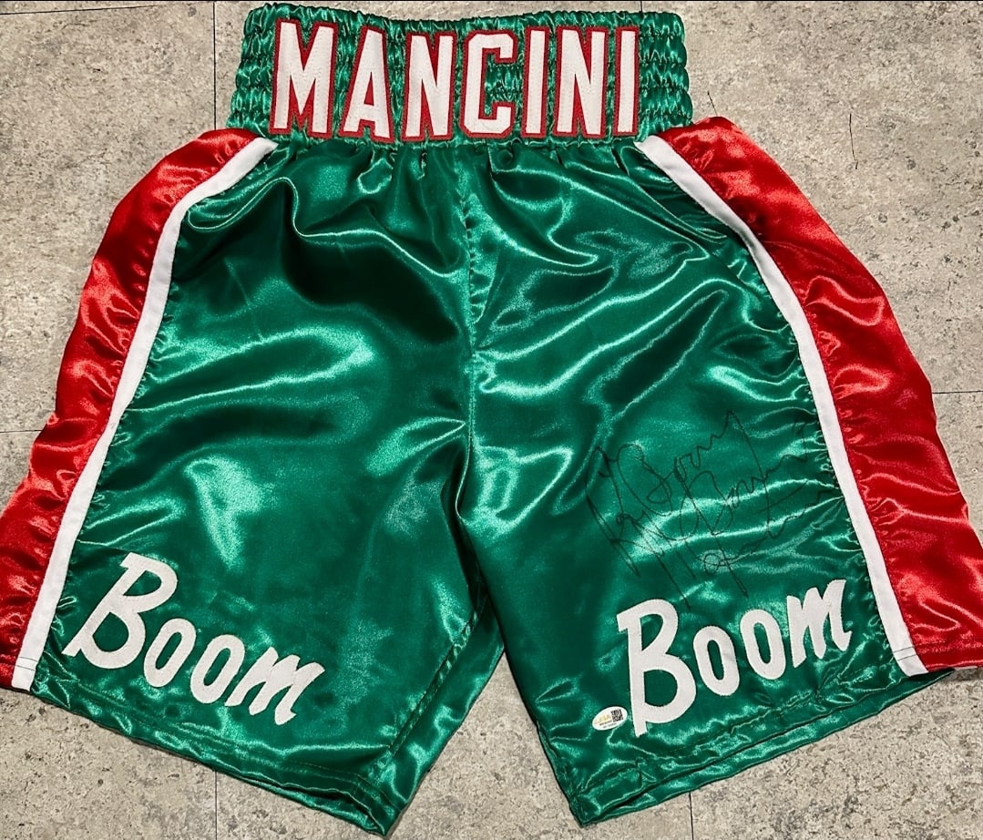 Ray BOOM BOOM Mancini Former Boxing Champion Autographed Boxing Trunks Hologram: Ray "BOOM BOOM" Mancini Former NABF & WBA Lightweight Boxing Champion Autographed Boxing Trunks JSA Witnessed QR Hologram - Autograph Location & coa # may vary 