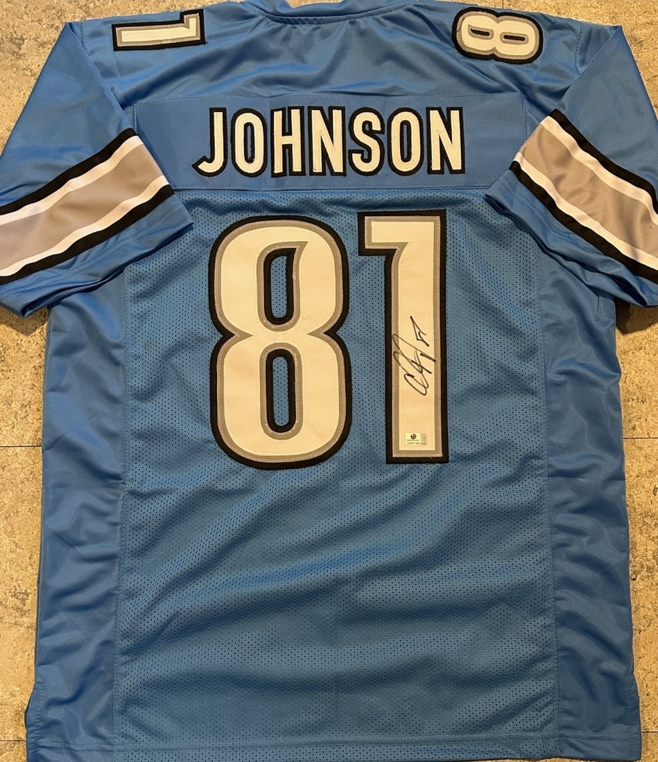 Calvin Johnson Detroit Lions Autographed Custom Football Style Jersey coa: Calvin Johnson Detroit Lions Autographed Custom Football Style Jersey GA COA - Autograph Location & coa # may vary JERSEY SIZE EXTRA LARGE - CUSTOM JERSEY MEANS NO LOGOS, NO TEAM NAMES, & NO BRAND