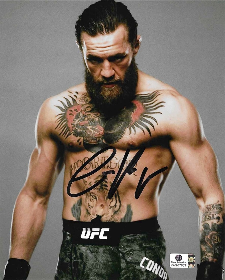 Autographed Conor McGregor UFC 8x10 Photo coa: Autographed Conor McGregor UFC 8x10 Photo GA coa - Autograph Location & coa # may vary