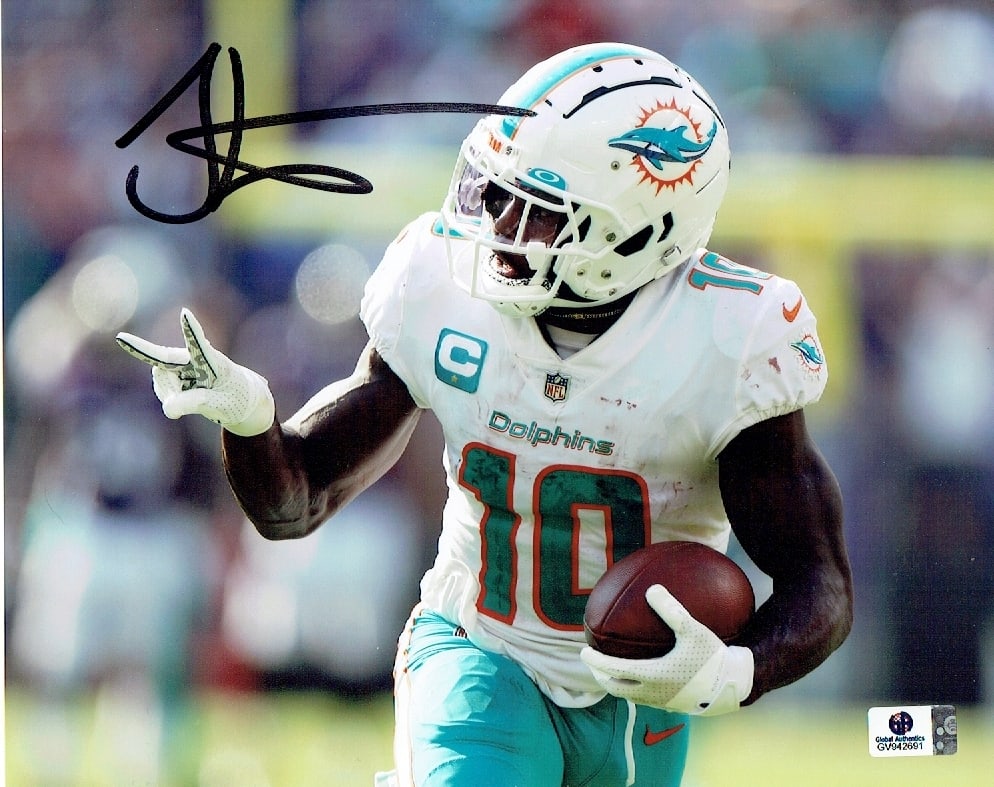 Autographed Tyreek Hill Miami Dolphins 8x10 Photo coa: Autographed Tyreek Hill Miami Dolphins 8x10 Photo GA coa - Autograph Location & coa # may vary 