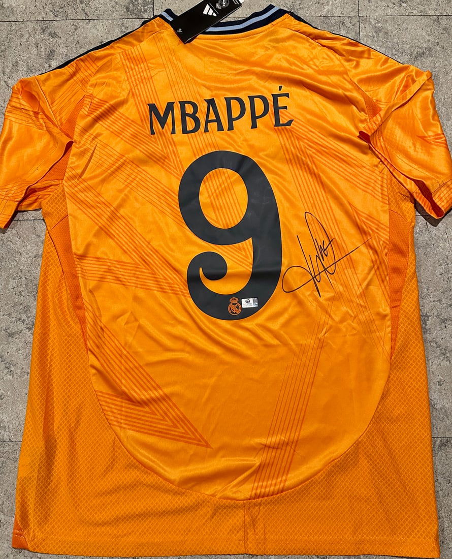 Autographed Kylian Mbappe Real Madrid 2024-25 Adidas Away Jersey COA: Autographed Kylian Mbappé Real Madrid 2024-25 Adidas Away Jersey GA coa - Autograph Location & coa # may vary JERSEY SIZE EXTRA LARGE