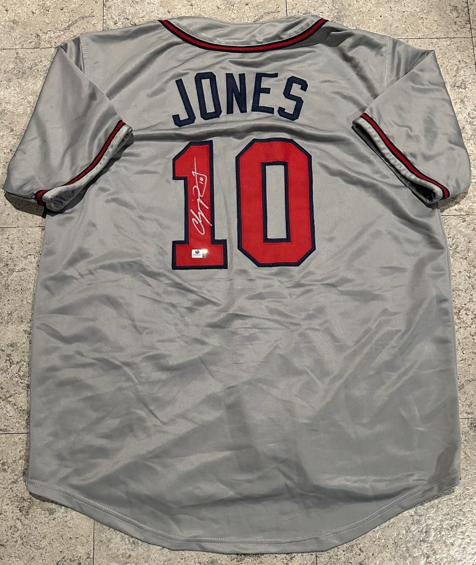 Autographed Chipper Jones Atlanta Braves Custom Baseball Jersey COA: Autographed Chipper Jones Atlanta Braves Custom Baseball Jersey GA COA ----- Autograph Location and coa number may vary JERSEY SIZE EXTRA LARGE - CUSTOM JERSEY MEANS NO LOGOS, NO TEAM NAMES, & NO