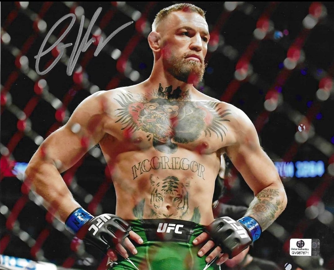 Conor McGregor UFC Autographed 8x10 Photo coa: Conor McGregor UFC Autographed 8x10 Hands on Hips Photo GA coa - Autograph Location & coa # may vary
