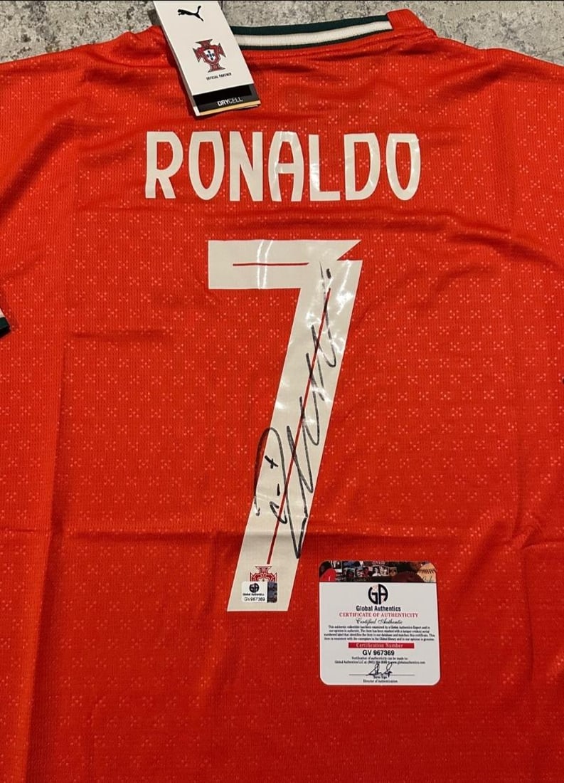Cristiano Ronaldo Real Madrid Autographed 2014-15 Adidas Home Soccer Jersey coa: Cristiano Ronaldo Real Madrid Autographed 2014-15 Adidas Home Soccer Jersey GA coa - Autograph Location & coa # may vary JERSEY SIZE EXTRA LARGE
