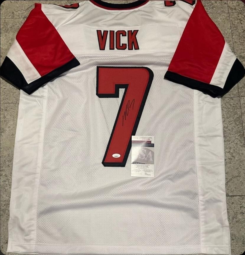 Michael Vick Atlanta Falcons Autographed Custom Football Jersey JSA coa: Michael Vick Atlanta Falcons Autographed Custom Football Style Jersey JSA Witnessed coa - Autograph Location & coa # may vary JERSEY SIZE EXTRA LARGE - CUSTOM JERSEY MEANS NO LOGOS, NO TEAM NAMES, & N