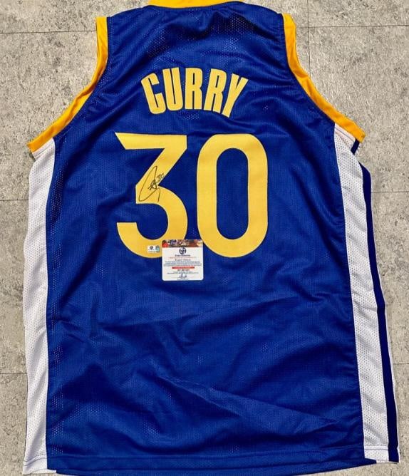 Stephen Curry Golden State Warriors Autographed Custom Basketball Jersey coa: Stephen Curry Golden State Warriors Autographed Custom Basketball Jersey GA coa - Autograph Location & coa # may vary JERSEY SIZE EXTRA LARGE - CUSTOM JERSEY MEANS NO LOGOS, NO TEAM NAMES, & NO BRAND