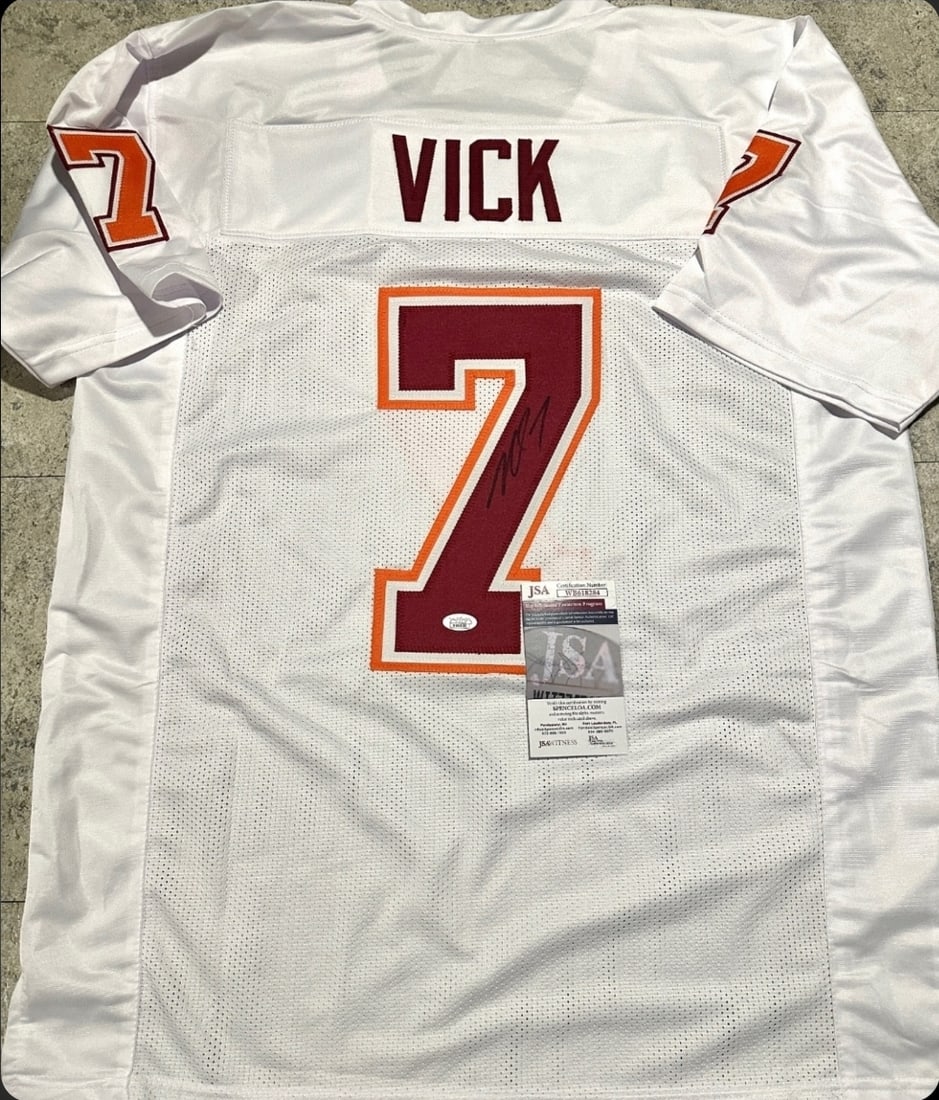 Michael Vick Virginia Tech Hokies Autographed Custom Football Jersey JSA coa: Michael Vick Virginia Tech Hokies Autographed Custom Football Style Jersey w/JSA Witnessed coa - Autograph Location & coa # may vary JERSEY SIZE EXTRA LARGE - CUSTOM JERSEY MEANS NO LOGOS, NO TEAM
