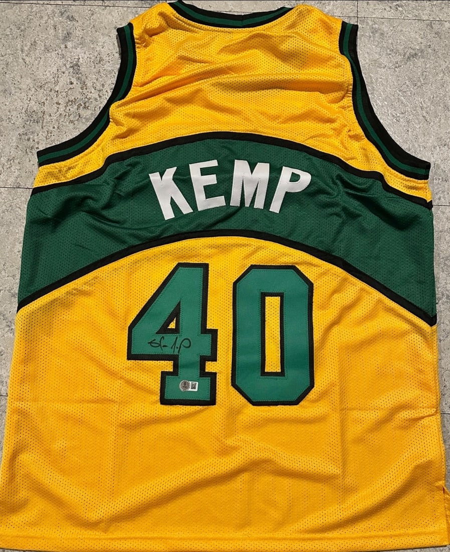 Shawn Kemp Seattle Super Sonics Autographed Custom Basketball Jersey Hologram: Shawn Kemp Seattle Super Sonics Autographed Custom Basketball Jersey Hologram - Autograph Location & coa # may vary JERSEY SIZE EXTRA LARGE - CUSTOM JERSEY MEANS NO LOGOS, NO TEAM NAMES, & NO BRAND NA