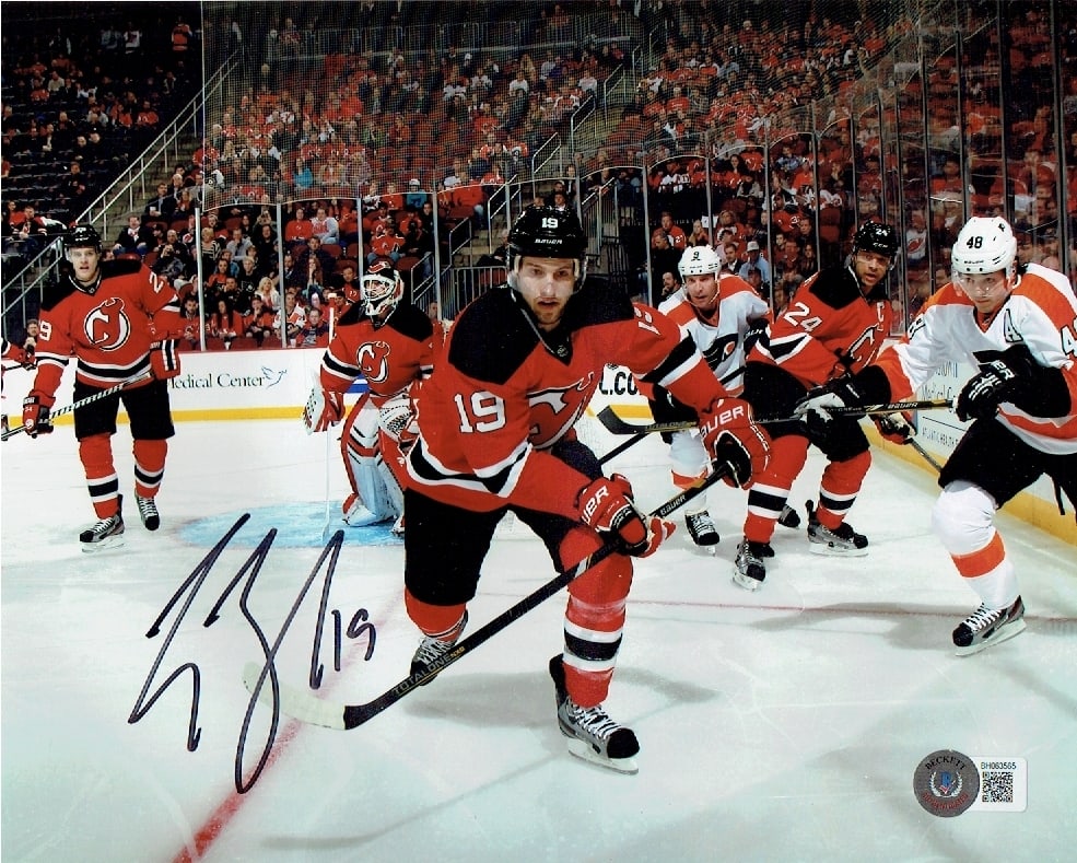 Travis Zajak New Jersey Devils Autographed 8x10 Photo Beckett Hologram: Travis Zajak New Jersey Devils Autographed 8x10 Photo Beckett QR Hologram Included (THERE IS NO COA CARDS WITH QR CODE HOLGRAMS - SCAN QR CODE WITH CAMERA TO VERIFY AUTHENTICITY) - Autograph Location