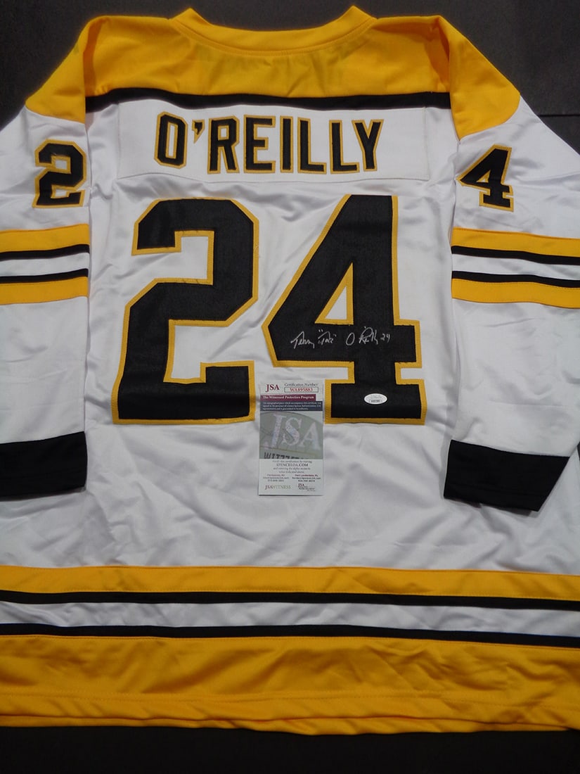 Terry O'Reilly Boston Bruins Autographed & Ins Custom Hockey Jersey JSA coa: Terry O'Reilly Boston Bruins Autographed & Inscribed "TAZ" Custom Hockey Jersey JSA Witnessed coa - Autograph Location & coa # may vary JERSEY SIZE EXTRA LARGE - CUSTOM JERSEY MEANS NO LOGOS, NO TEAM