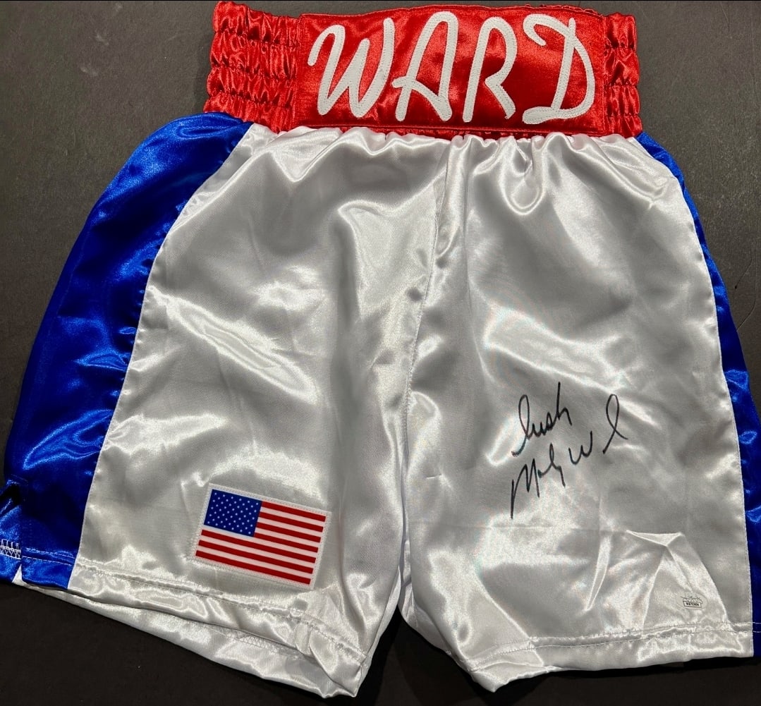 Micky Ward Former WBU Boxing Champion Autographed Boxing Trunks JSA COA: Irish Micky Ward Former WBU Light Welterweight Boxing Champion Autographed Boxing Trunks JSA WITNESSED QR HOLOGRAM INCLUDED (THERE IS NO COA CARDS WITH QR CODE HOLGRAMS - SCAN QR CODE WITH CAMERA ON P