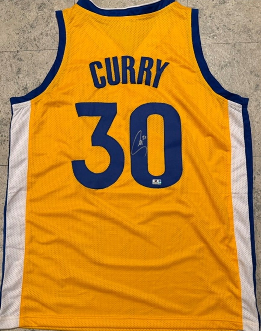 Stephen Curry Golden State Warriors Autographed Custom Basketball Jersey coa: Stephen Curry Golden State Warriors Autographed Custom Basketball Jersey GA coa - Autograph Location & coa # may vary JERSEY SIZE EXTRA LARGE - CUSTOM JERSEY MEANS NO LOGOS, NO TEAM NAMES, & NO BRAND