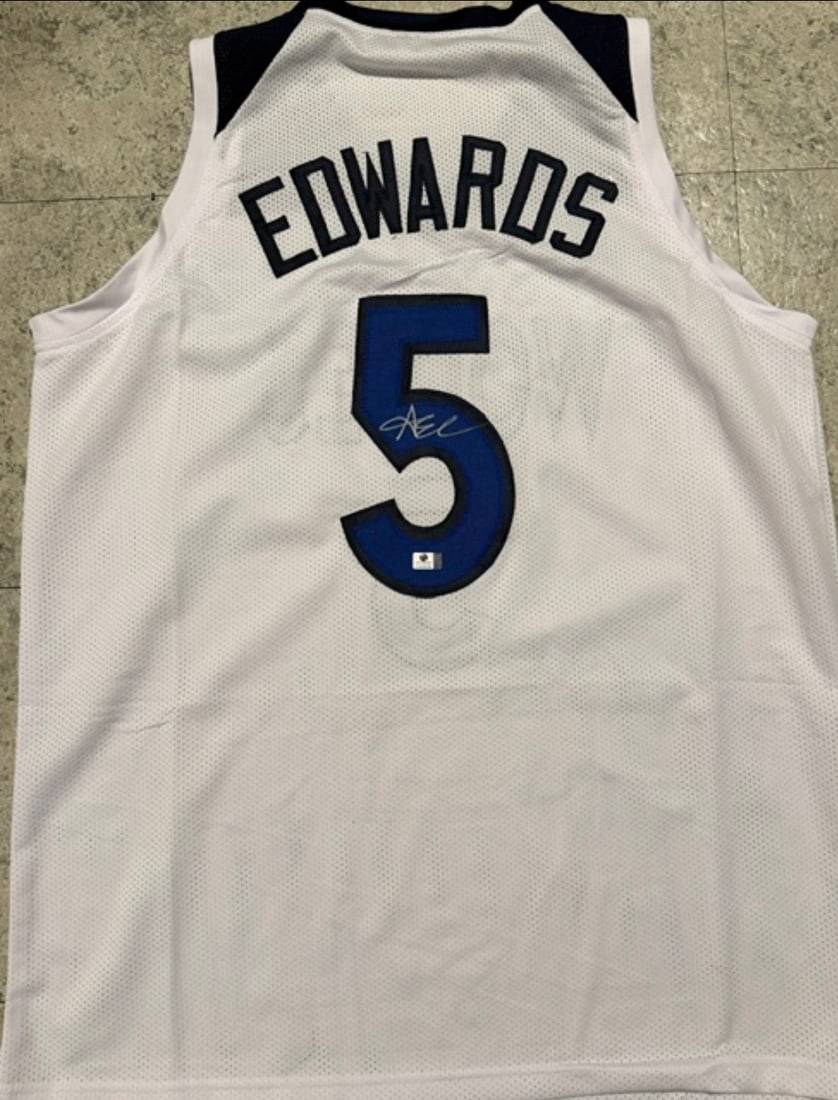 Anthony Edwards Minnesota Timberwolves Autographed Custom Basketball Jersey coa: Anthony Edwards Minnesota Timberwolves Autographed Custom Basketball Jersey GA coa - Autograph Location & coa # may vary JERSEY SIZE EXTRA LARGE - CUSTOM JERSEY MEANS NO LOGOS, NO TEAM NAMES, & NO