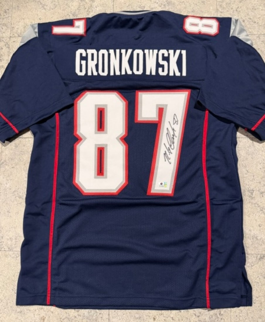 Rob Gronkowski New England Patriots Autographed Custom Football Jersey coa: Rob Gronkowski New England Patriots Autographed Custom Football Jersey GA coa - Autograph Location & coa # may vary JERSEY SIZE EXTRA LARGE - CUSTOM JERSEY MEANS NO LOGOS, NO TEAM NAMES, & NO BRAND