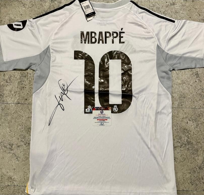 Kylian Mbappe Real Madrid Autographed 2025-26 Adidas Home Jersey coa: Kylian Mbappé Real Madrid Autographed 2025-26 Adidas Home Jersey GA coa - Autograph Location & coa # may vary JERSEY SIZE EXTRA LARGE
