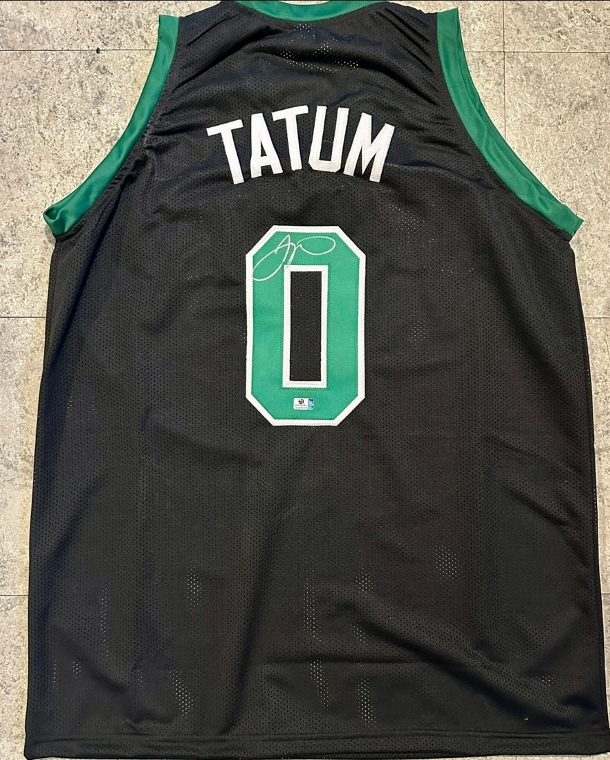Jayson Tatum Boston Celtics Autographed Custom Basketball Jersey coa: Jayson Tatum Boston Celtics Autographed Custom Basketball Jersey GA coa - Autograph Location & coa # may vary JERSEY SIZE EXTRA LARGE - CUSTOM JERSEY MEANS NO LOGOS, NO TEAM NAMES, & NO BRAND NAMES