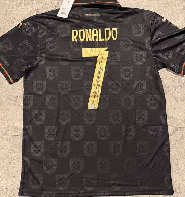 Cristiano Ronaldo Portugal Autographed 2025-26 Puma Special Edition Soccer Jersey LOA: Cristiano Ronaldo Portugal Autographed 2025-26 Puma Special Edition 'Pantera Negra' Soccer Jersey GA Letter of Authenticity - JERSEY SIZE EXTRA LARGE
