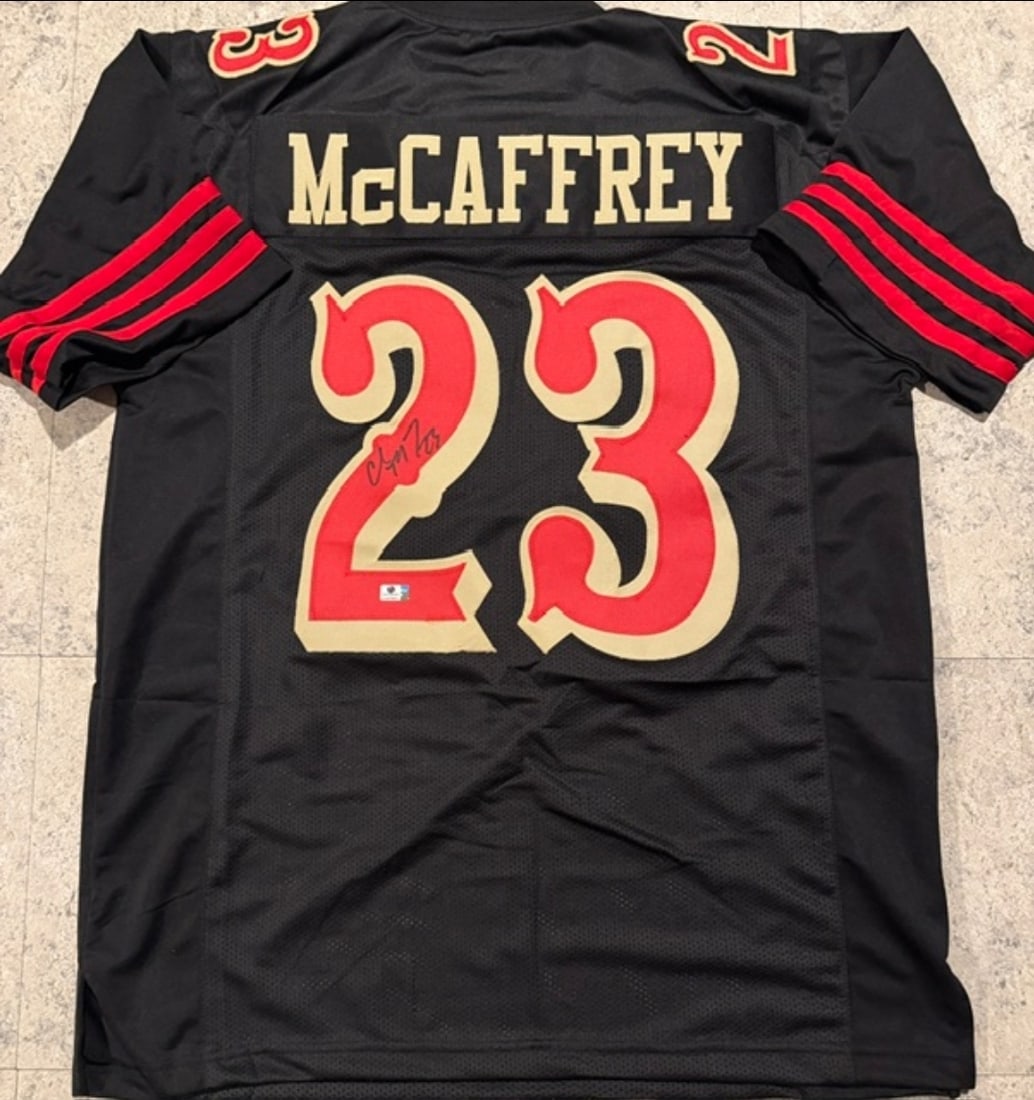 Christian McCaffery San Francisco 49ers Autographed Custom Football Jersey coa: Christian McCaffery San Francisco 49ers Autographed Custom Football Jersey GA coa - Autograph Location & coa # may vary JERSEY SIZE EXTRA LARGE - CUSTOM JERSEY MEANS NO LOGOS, NO TEAM NAMES, & NO