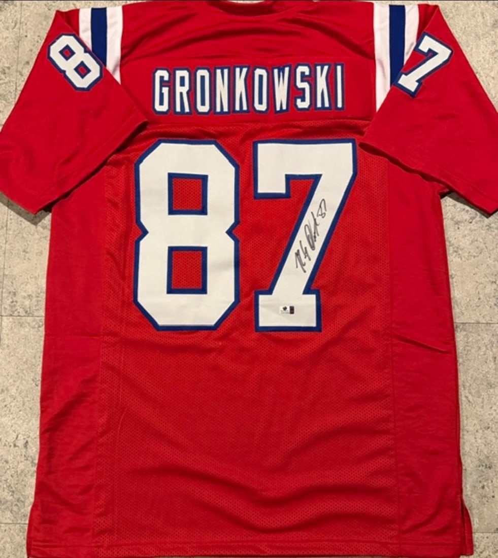 Rob Gronkowski New England Patriots Autographed Custom Football Jersey coa: Rob Gronkowski New England Patriots Autographed Custom Football Jersey GA coa - Autograph Location & coa # may vary JERSEY SIZE EXTRA LARGE - CUSTOM JERSEY MEANS NO LOGOS, NO TEAM NAMES, & NO BRAND