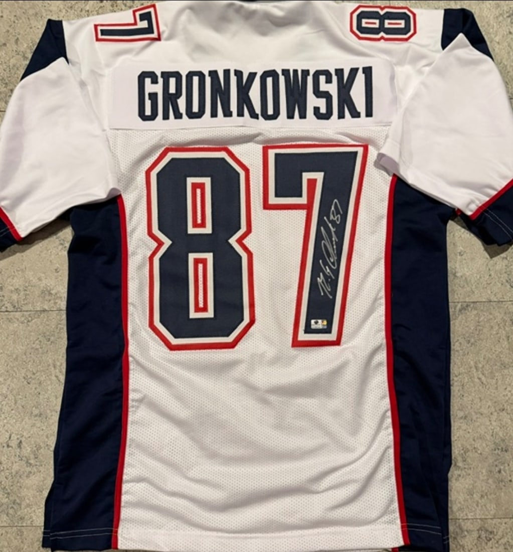 Rob Gronkowski New England Patriots Autographed Custom Football Jersey coa: Rob Gronkowski New England Patriots Autographed Custom Football Jersey GA coa - Autograph Location & coa # may vary JERSEY SIZE EXTRA LARGE - CUSTOM JERSEY MEANS NO LOGOS, NO TEAM NAMES, & NO BRAND