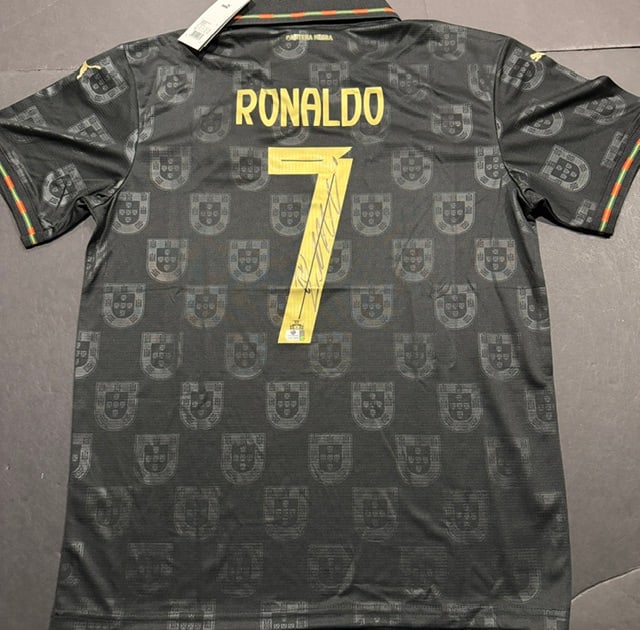 Cristiano Ronaldo Portugal Autographed 2025-26 Puma Special Edition Soccer Jersey LOA: Cristiano Ronaldo Portugal Autographed 2025-26 Puma Special Edition 'Pantera Negra' Soccer Jersey GA Letter of Authenticity - JERSEY SIZE EXTRA LARGE