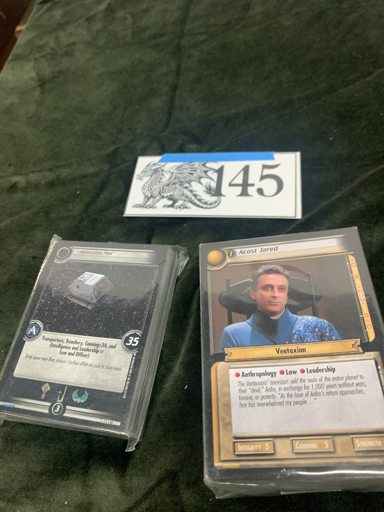 Star Trek CCG Card Packs: Estimated Value: 5 - 1000. 2 Thick packs, Item Dimensions: 4x3x3in, Item Weight: 1lb