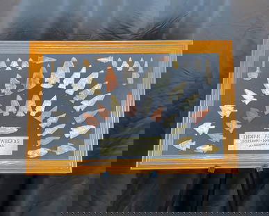 Frame of Arrowheads from Missouri, Arkansas, and Illinois: A visually striking collection of stone points attractively arranged in a wooden frame, labeled with origins from Missouri, Arkansas, and Illinois. Featuring a wide range of colors and shapes, this as
