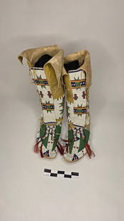 High Top Beaded Mocs - pre 1900: Tall beaded moccasins with classic Plains designs in white, green, and red, fully beaded with fringe and horsehair accents.reference: native american, indian artifact, arrowhead, paleo, clovis, dalton