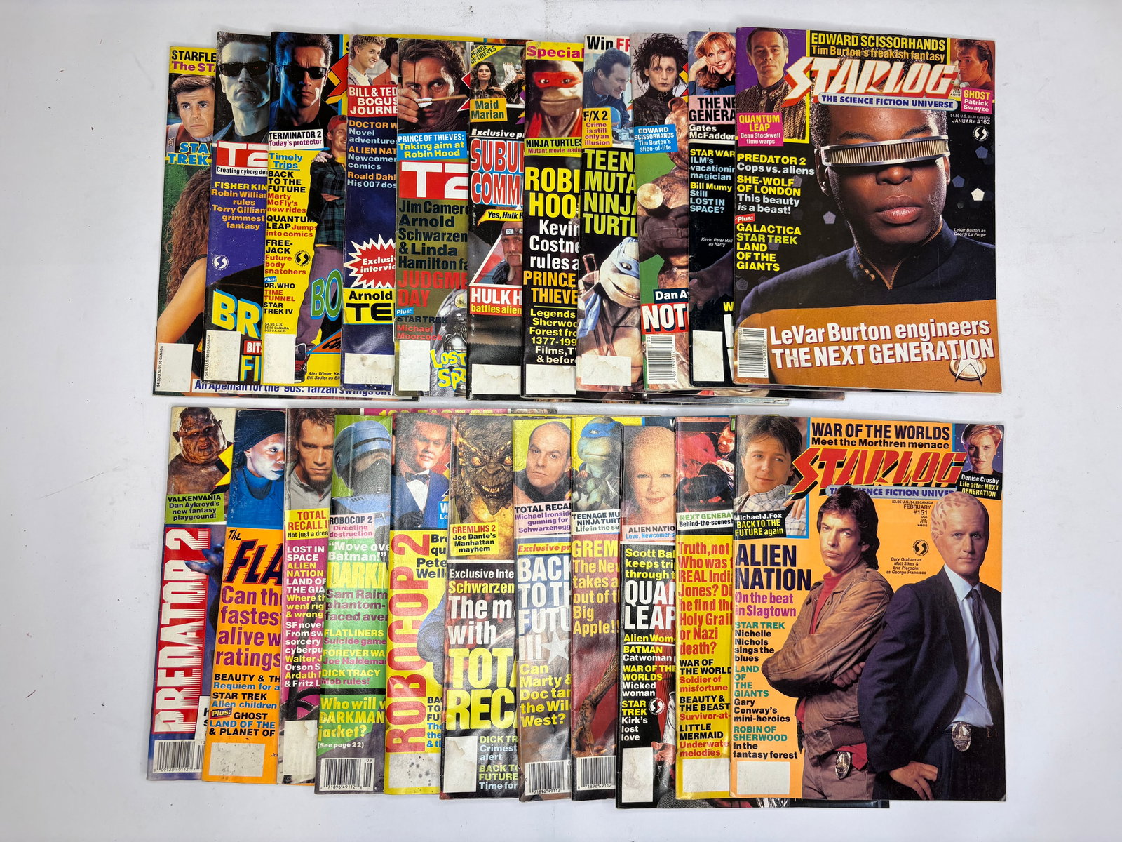 Starlog Magazine #151-200: Assortment of Starlog magazines, issues 151–200, with glossy full-color covers featuring film and television cover art and bold mastheads. Paperback issues show spine labels and barcode boxes; sever