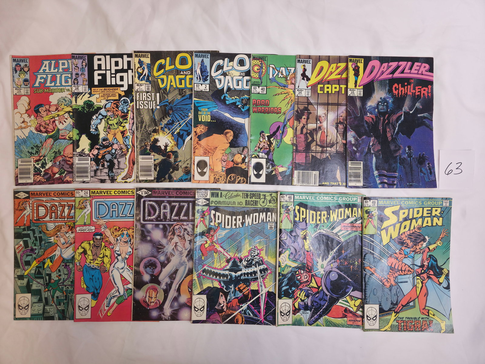 Various Issues of Spider-Woman, Cloak and Dagger, Alpha Flight, and Dazzler (1 of 3)