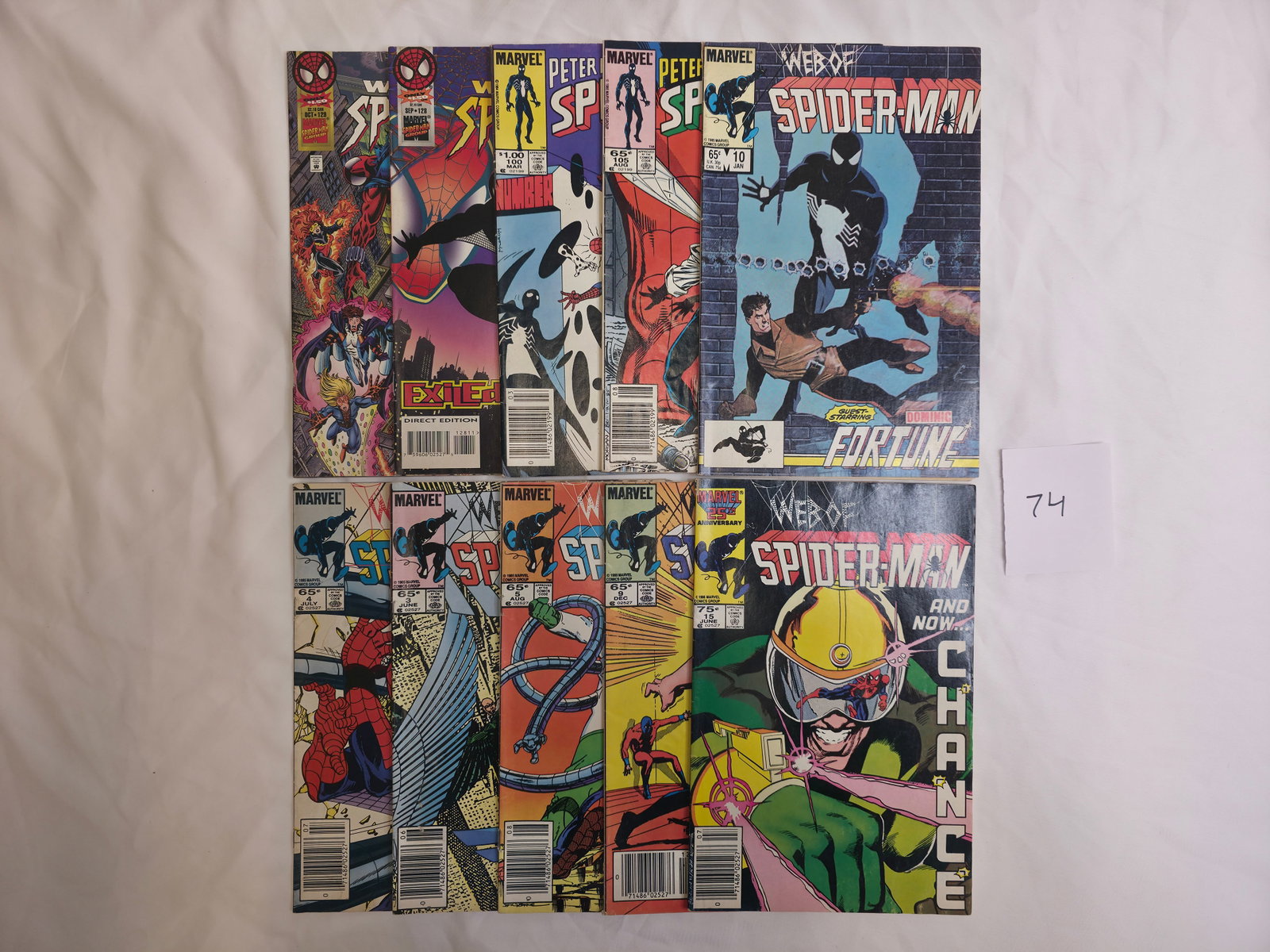 Assorted Web of Spider-Man and Peter Parker the Spectacular Spider-Man: Assortment of Spider-Man comic issues from the Web of Spider-Man and Peter Parker: The Spectacular Spider-Man runs with full-color illustrated covers featuring Spider-Man in both black symbiote and cl