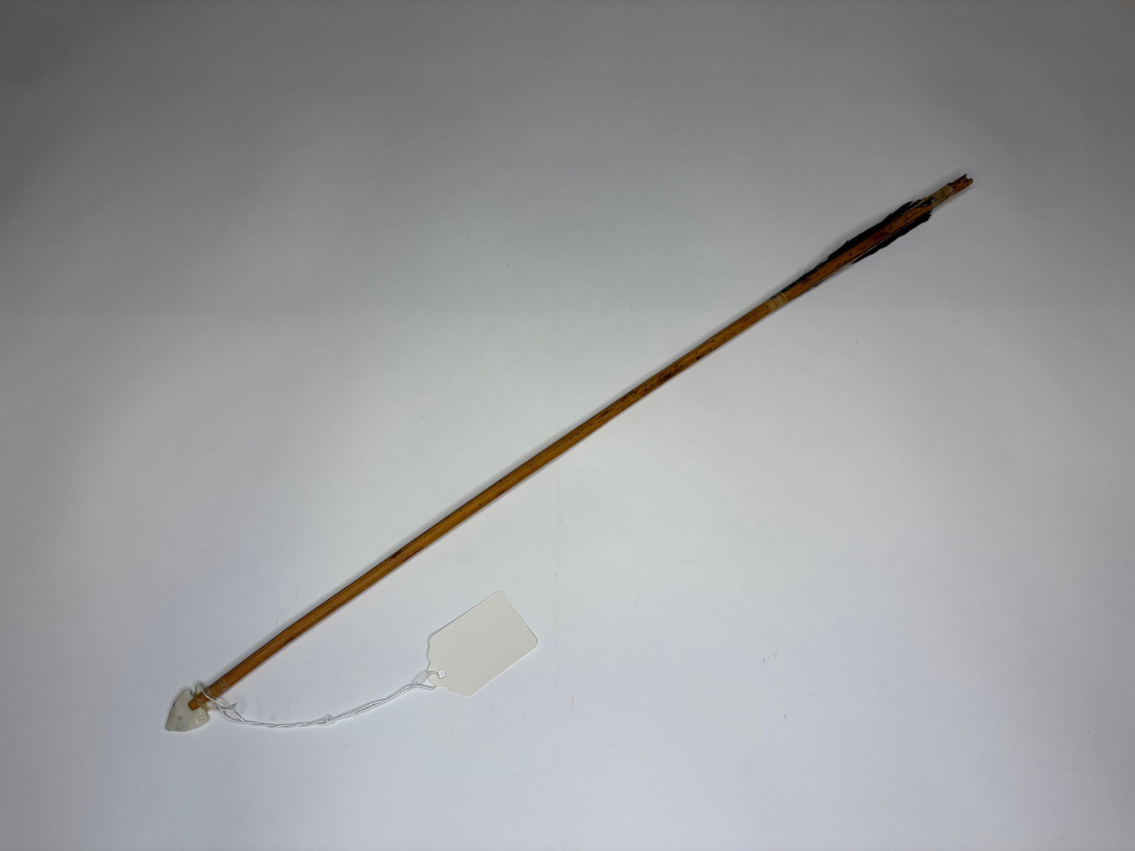 Southern plains arrow with stone tip, sinew, paint, pre-1892 (1 of 3)
