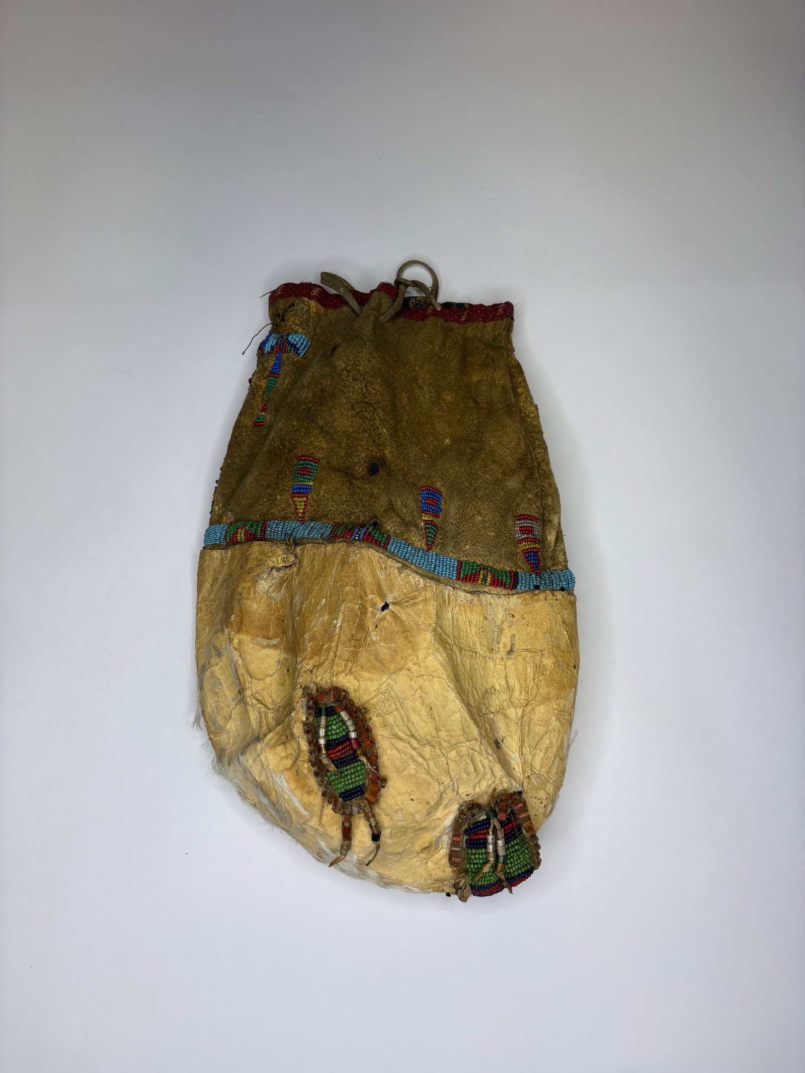 Southern plains Beaded calf-head bag. Early, pre-1900 (1 of 2)