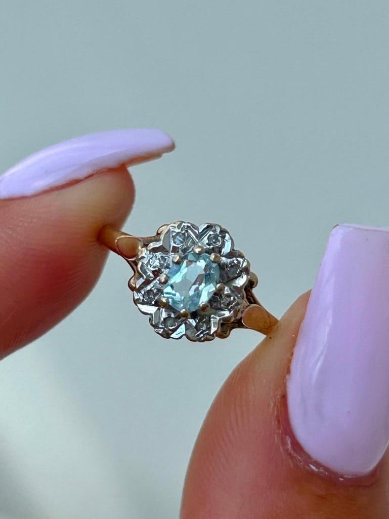 9ct Yellow Gold Aquamarine and Diamond Flower Ring: 9ct Yellow Gold Aquamarine and Diamond Flower Ring truly beautiful ring! measurements size UK L1/2 US 6 head of ring 10mm x 10mm weight 2g hallmarked 9.375 </