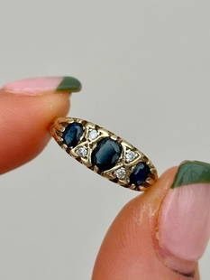 Yellow Gold Diamond and Sapphire Ring: Diamond and sapphire ring  wonderful chunky sapphire stones  measurements ring size UK N1/2 or US 7 head of ring 15x5mm weight 2.03g hallmarked 9ct condition: see photos office use: uq2