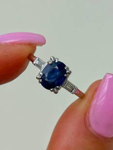 Platinum Sapphire and Diamond Ring: Platinum Sapphire and Diamond Ring&#160; &#160; excellent sapphire ring with diamond baguette shoulders &#160; measurements&#160; size UK K1/2 US 51/2 head of ring 13mm x 7mm weight 4.45g&#160;