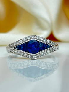 Art deco 18ct white gold sapphire and diamond ring: Art deco 18ct white gold sapphire and diamond ring  a very pretty art deco style ring&#160;  measurements size UK O US 71/2 head of ring 15mm x 8mm weight 3g stamped 750  materials&#160;