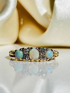 Antique 18ct Yellow Gold Opal and Diamond Ring: Antique 18ct Yellow Gold Opal and Diamond Ring  sweet opals with diamond details&#160;  measurements&#160; size UK N US 7 head of ring 15mm x 5mm weight 3.43g  materials&#160; 18ct yellow go
