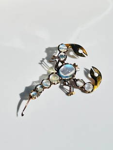 Vintage 9CT gold moonstone scorpion brooch: Vintage 9CT gold moonstone scorpion brooch the sweetest moonstone brooch measurements size 33mm x 21mm weight 1.62g materials 9ct gold and moonstone nz