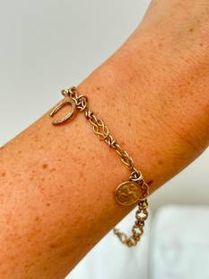 Vintage 9ct Yellow Gold Charm Bracelet: Vintage 9ct Yellow Gold Charm Bracelet&#160; &#160; truly charming charm bracelet&#160; &#160; measurements length 22.5cm weight 7.50g &#160; materials&#160;&#160; 9ct Yellow gold
