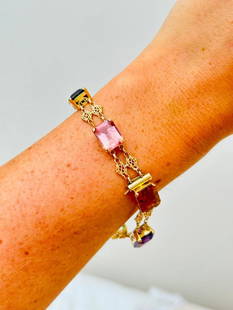 Vintage Gold Multi Stone Bracelet: Vintage Gold Multi Stone Bracelet&#160; &#160; a beautiful multigem bracelet!! AF/ stones rubbed&#160; &#160; measurements length 20cm width 9mm weight 23.64g &#160; materials&#160;</p
